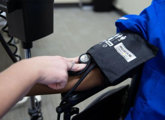 students taking blood pressure