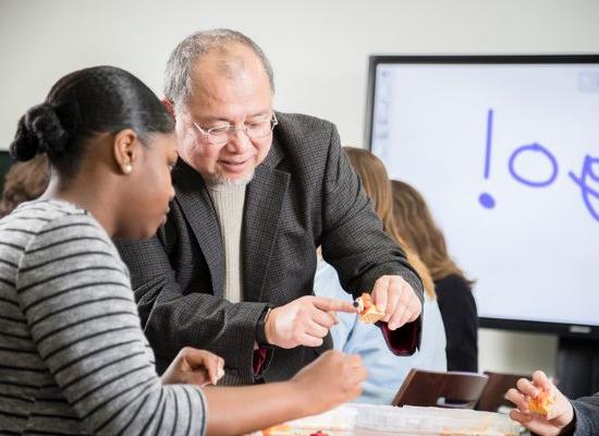 Student and Instructor in a classroom setting